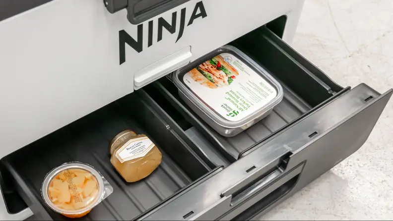 The DryZone drawer open on the Ninja FrostVault.