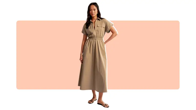 A midi-length shirt dress with an elastic waistband.