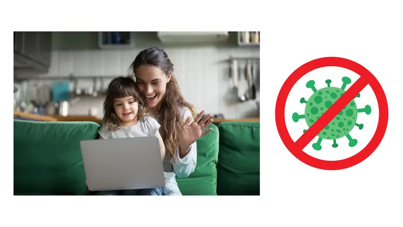Mother and child using a laptop together on a couch with a no-virus symbol representing online protection.
