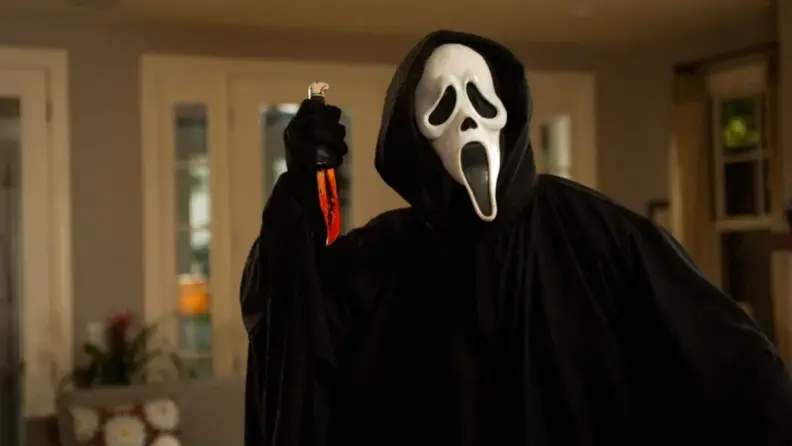 The Ghostface killer from "Scream" with a knife in hand.