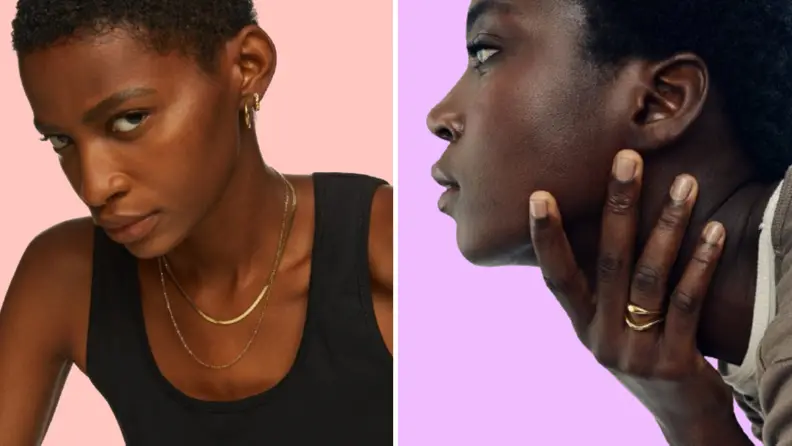 Two models wearing gold jewelry