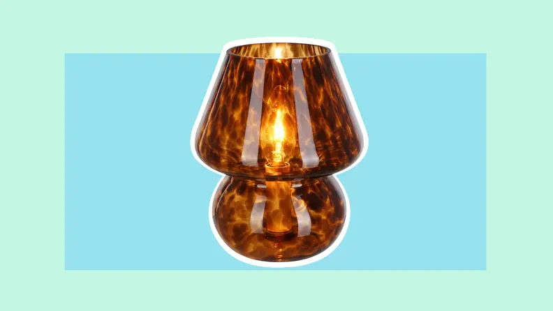 Tortoise colored glass mushroom-shaped lamp to be placed in your dorm room.
