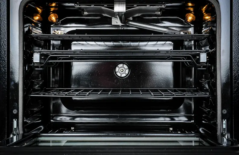 Looking inside of an open oven.