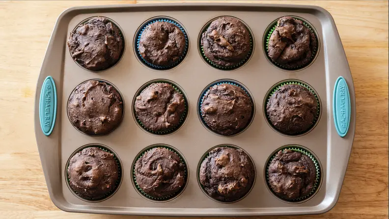 Chocolate muffins inside a Rachael Ray Yum-O! Muffin Pan