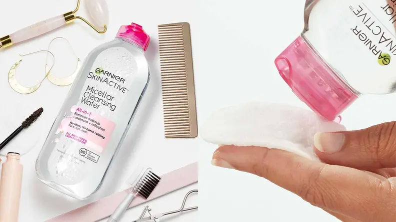 On the left: The Garnier SkinActive Micellar Cleansing Water laying on a white surface with beauty products laying all around it. On the right: A person's hand holds a round cotton pad and the Garnier micellar water hovers above it to dispense formula.