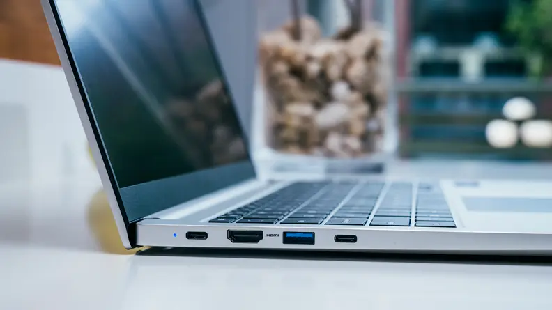 The left side of the Galaxy Book, which houses two USB-C ports, an HDMI port, and a USB-A port.