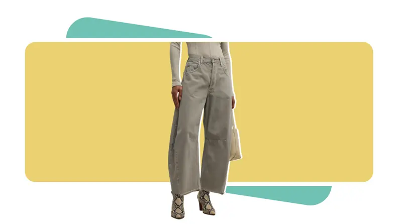 A model wearing gray jeans.