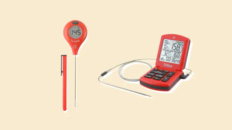 Two meat thermometers on beige background.