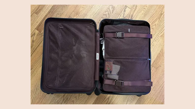 inside of packed suitcase on floor
