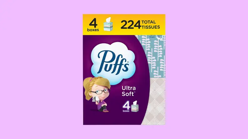 A purple package of Puffs Ultra Soft on a purple background.