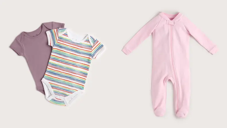 Purple, pink and rainbow children's onesies.