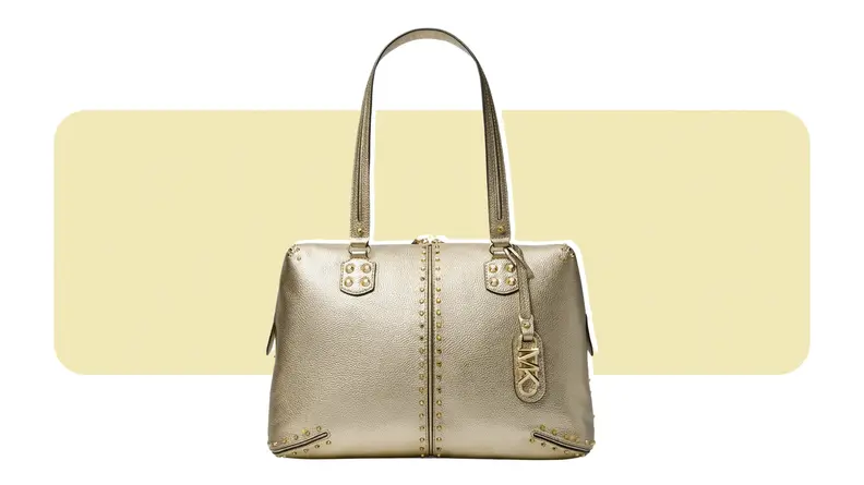A gold zip-top tote bag.