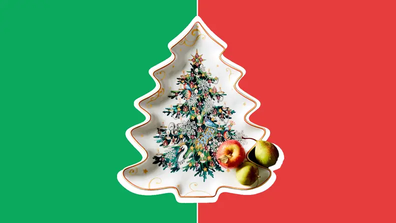White Christmas tree shaped cookie platter with small fruits in front of red and green collage.