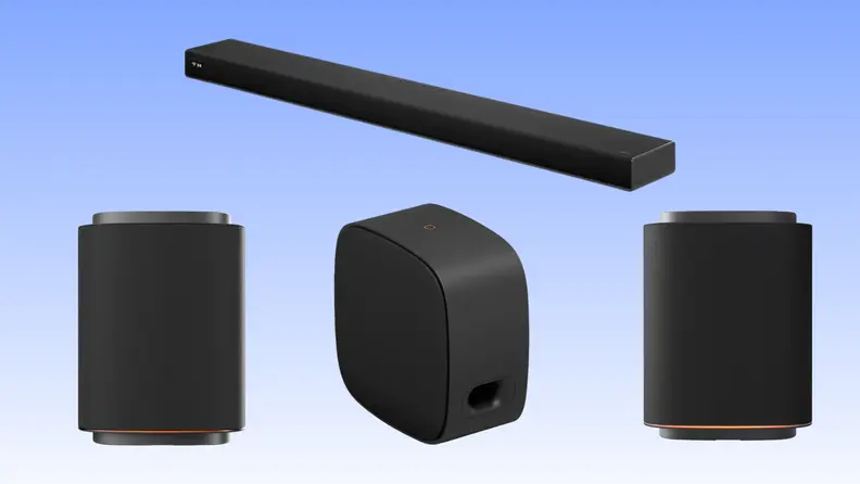 A complete LG Dolby Atmos soundbar system featuring a slim black soundbar, two wireless rear speakers, and a compact wireless subwoofer displayed against a light blue background.