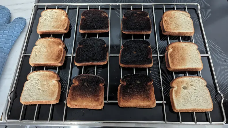Twelve pieces of toast that were tested in the Frigidaire Gallery stove broil setting.