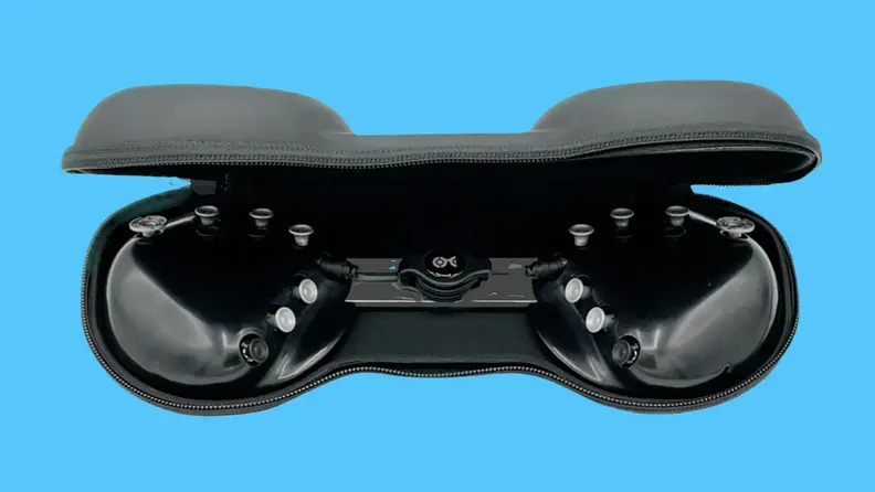 Charachorder One in travel case against blue background