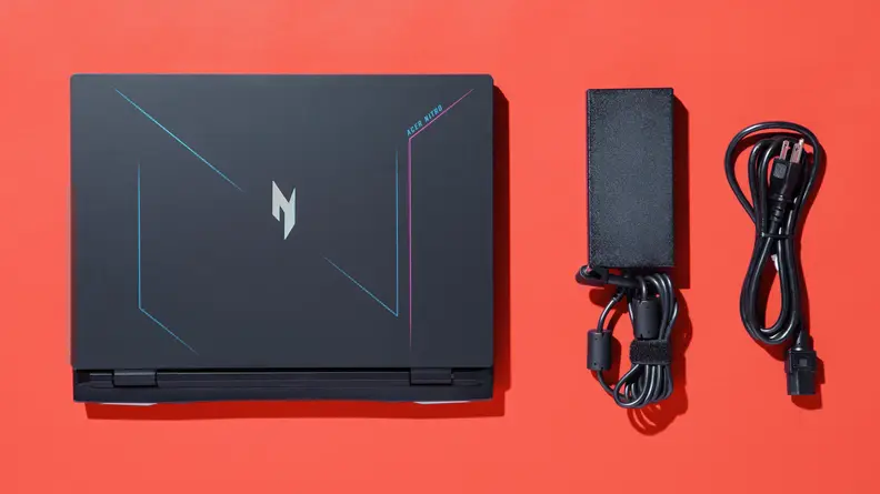 The Acer. itro 16 along with its A/C cable.