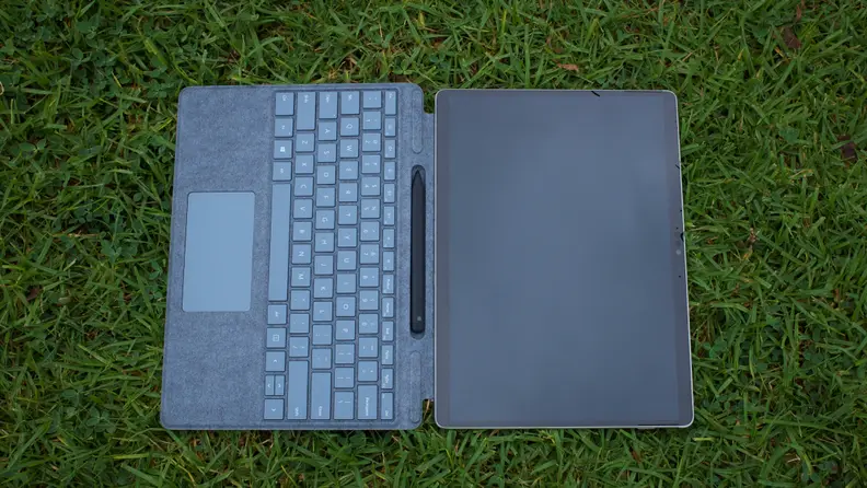 An overhead view of the Surface Pro X with the Type Cover attached.