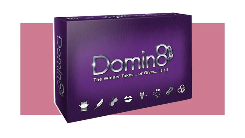 Domin8 game box on a pink background.