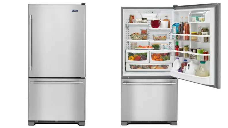A Maytag refrigerator with a bottom freezer