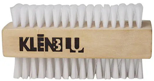 Two-sided sneaker brush.