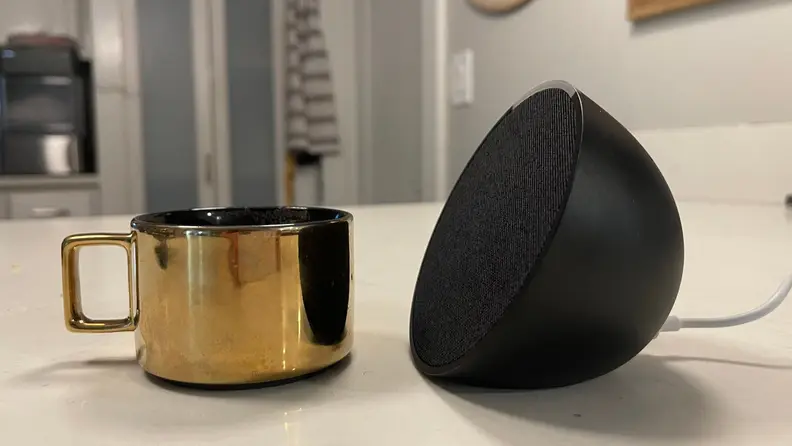 The Echo Pop next to a small Espresso cup