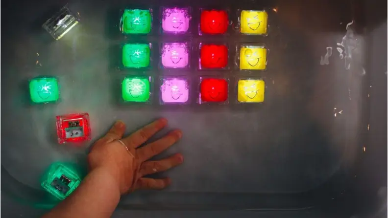 Four rows of light bath cubes in multiple colors.