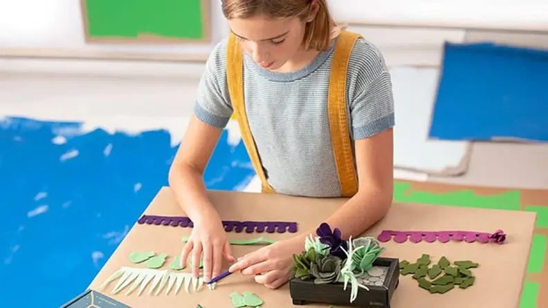 Girl working on crafts project