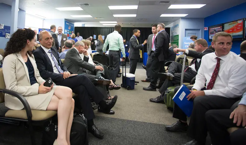 Potential Walmart suppliers gather at the company's Bentonville, Arkansas, home office before the supplier meeting.
