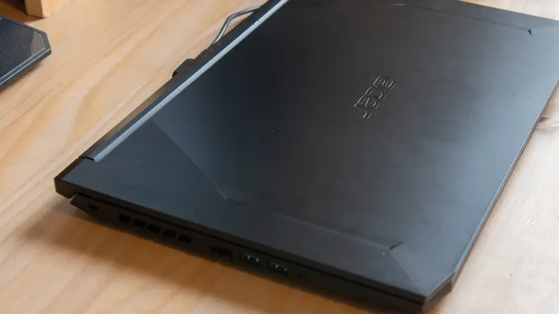 The laptop lies on a desk