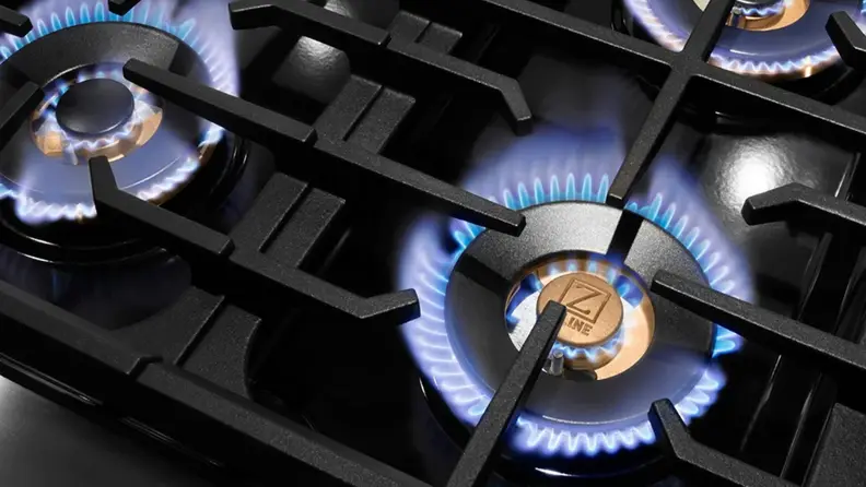 A closeup of the dual-ring burners on the zline 36-inch DuoPro cooktop