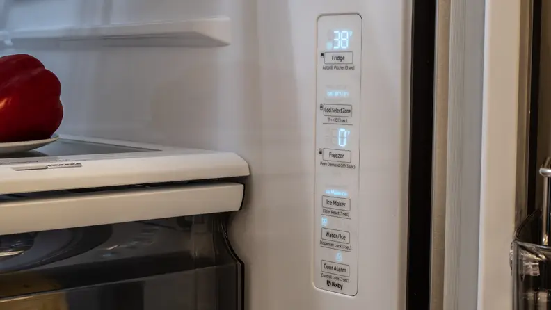 The Samsung RF28R6301SR's controls, which are located on the inner right wall.