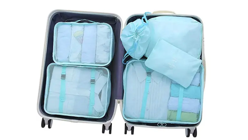 Packing cubes in a suitcase.