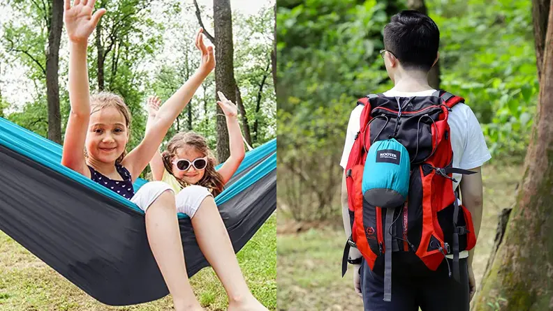 Two people rest in a hammock.