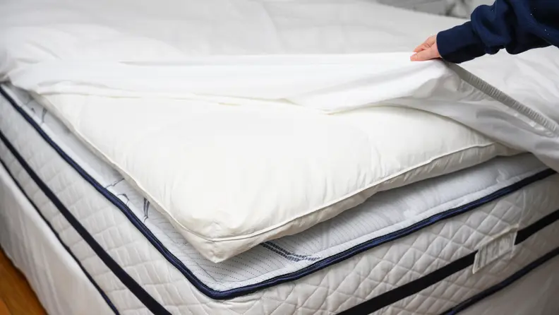 How to keep a mattress topper in place.