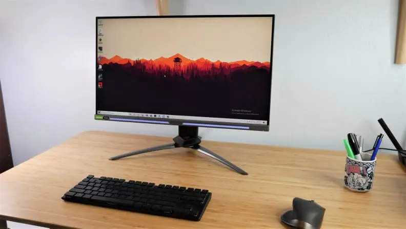 Acer's Predtor monitor set up at a desk, along with a wireless keyboard and mouse.
