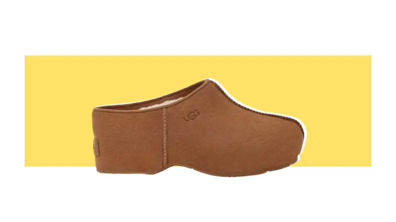 A platform brown shearling clog.