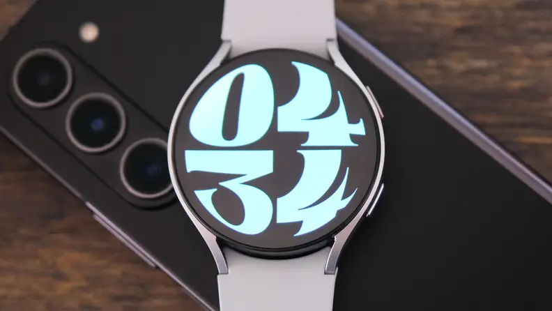 A close up of the Samsung Galaxy Watch 6 screen, featuring the time.