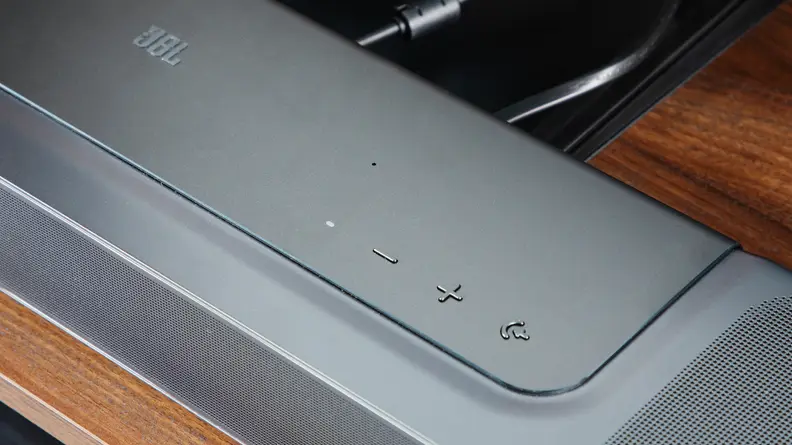 An upclose view of the JBL Bar 1300X volume buttons.