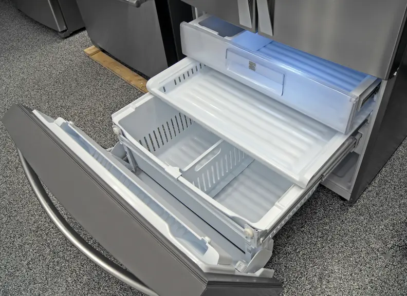The Kenmore Elite 74025's tilt-down door makes it easy to access the freezer drawers, as long as you have the kitchen space for a full extension.