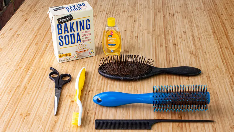 Tools for cleaning a hairbrush