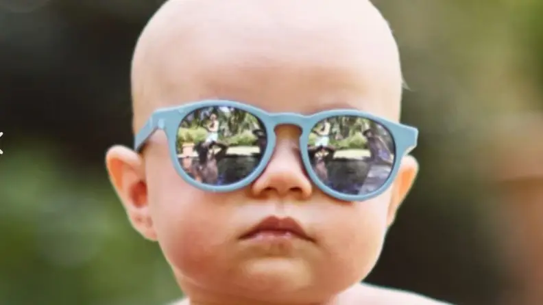A baby with polarized sunglasses.