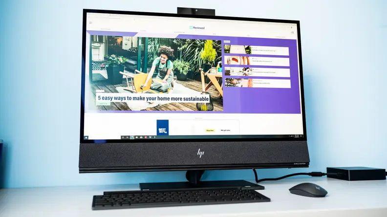 The HP Envy displays the Reviewed home page