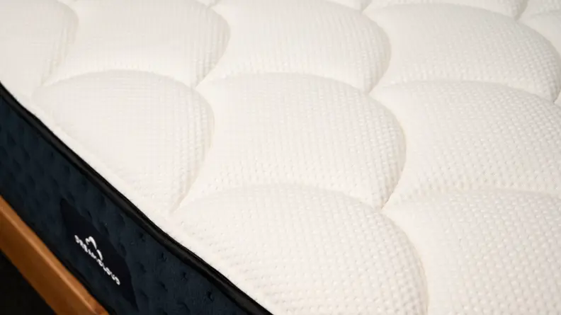 the dreamcloud's surface showing its scalloped pattern and slight sheen