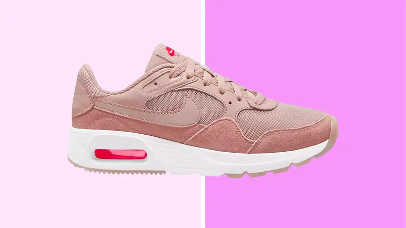 An image of a pale pink Nike SC Running shoe with white soles.