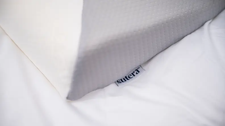 close shot of the Dream Deep pillow with its Sutera tag