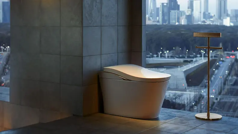 A beautifully designed toilet in a high-rise bathroom.