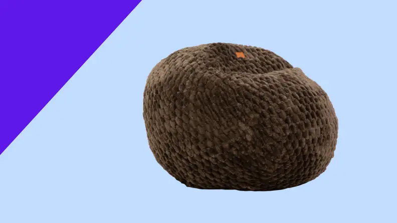 A brown bean bag on a blue background