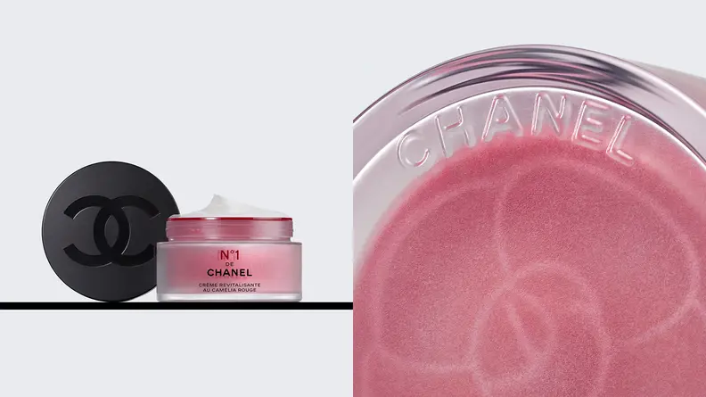 On the left: A pink jar of moisturizer uncapped with the black lid that contains a Chanel logo standing up next to the jar. On the right: A closeup on the bottom of the pink jar with a flower imprint on the packaging.