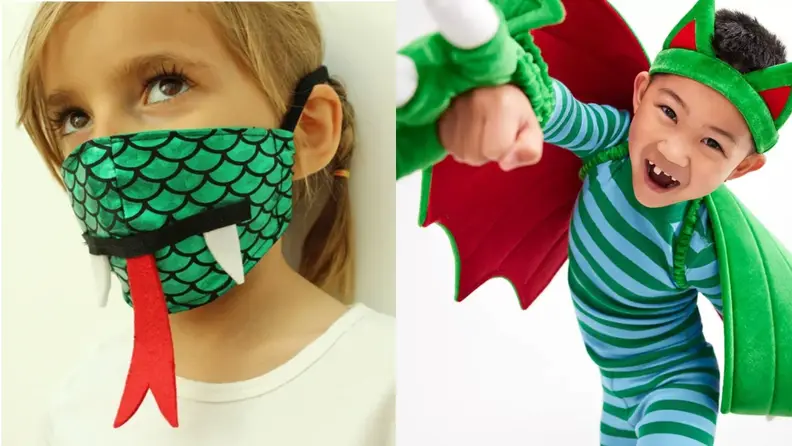 A dragon mask with a tongue and a child with a dragon costume.